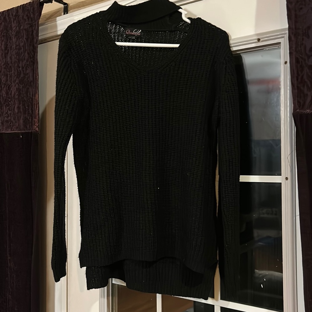 black sweater with v-neck and collar